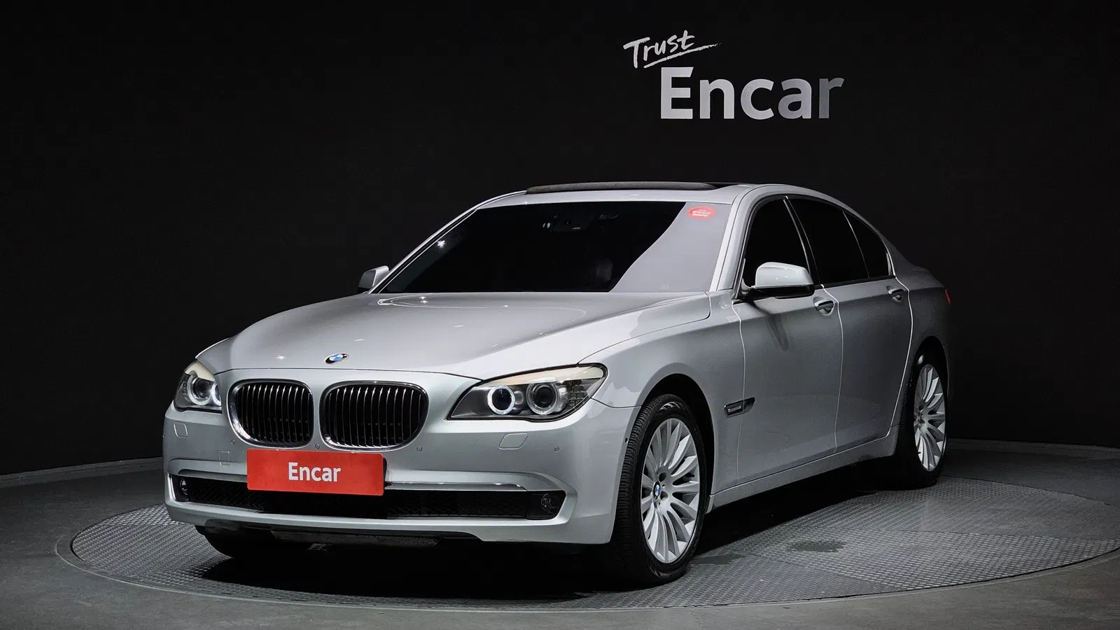 BMW Série 7 (F01) 740i 2012 — photo 1 sur 8