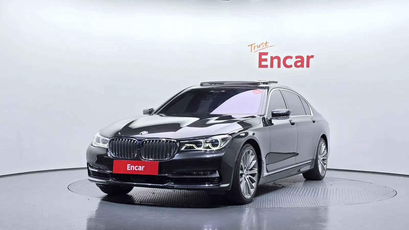 BMW Série 7 (G11) 750Li xDrive Premium 2016 — photo 1 sur 20