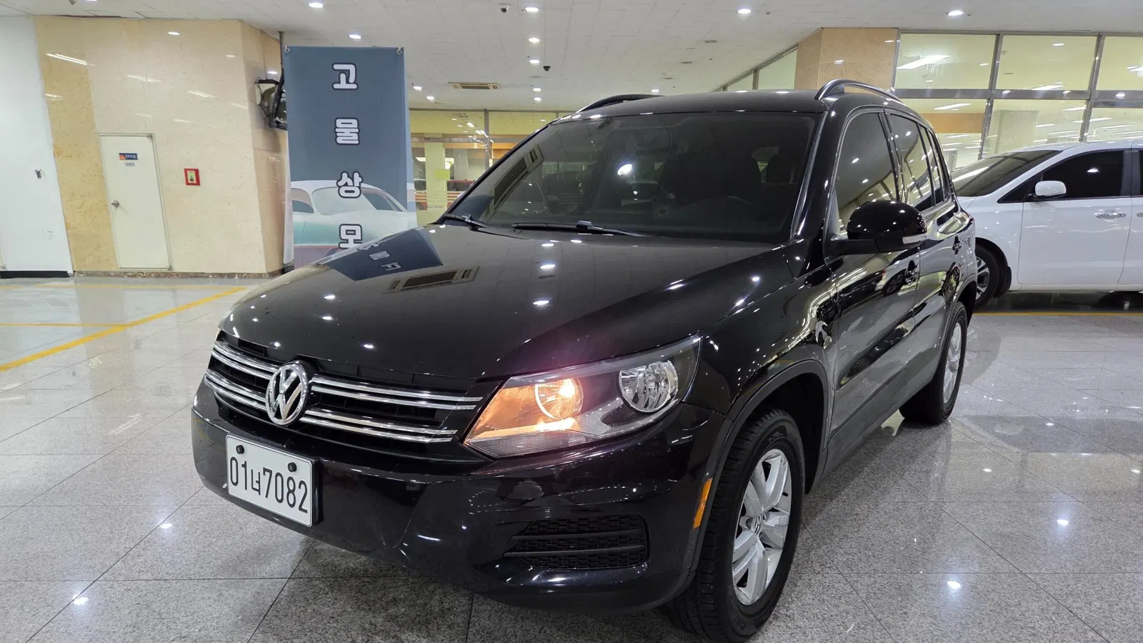 Volkswagen Tiguan 2.0 TSI 2015 — photo 1 sur 26