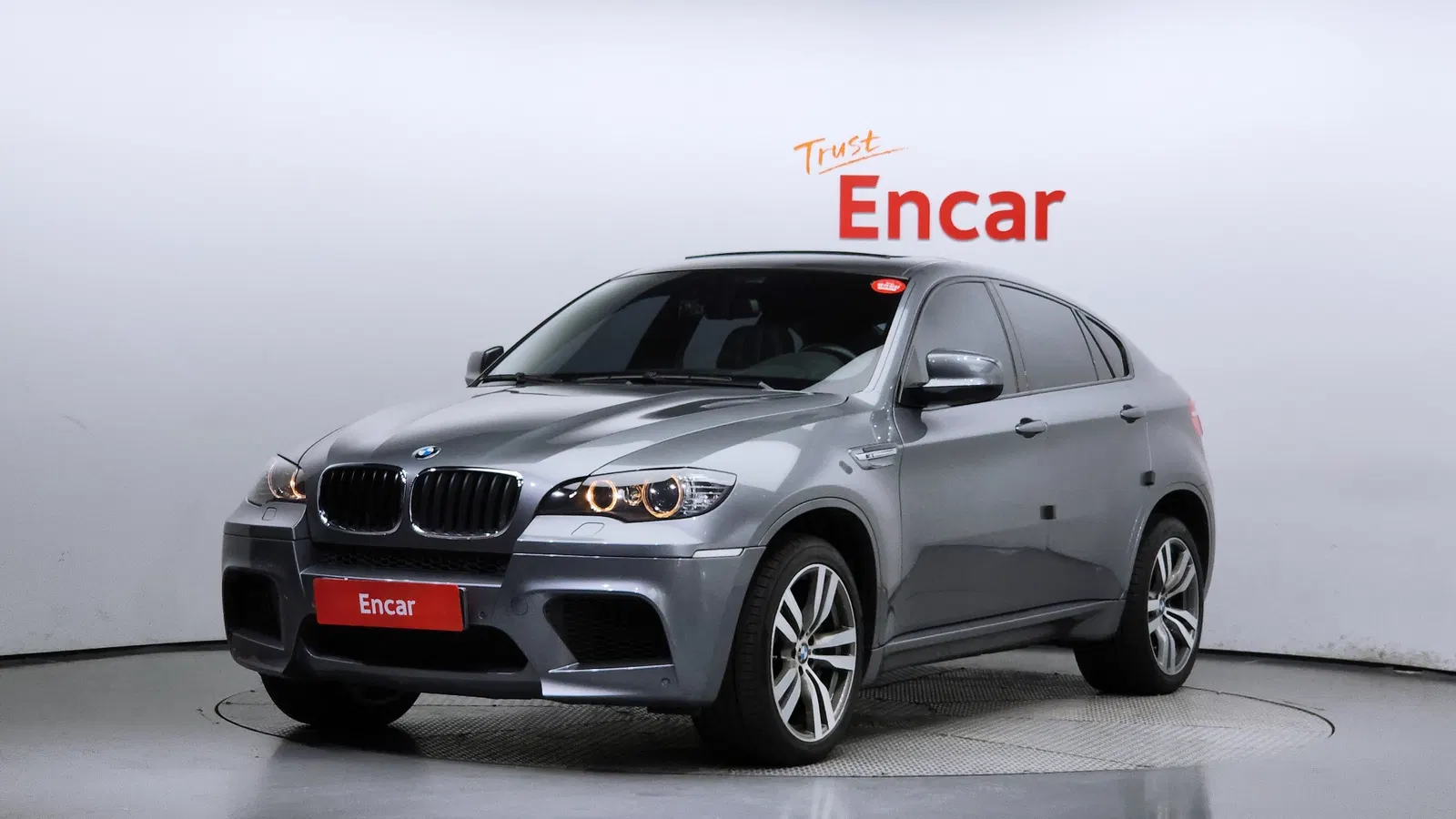 BMW X6M (E71) 4.4 2010 — photo 1 sur 26