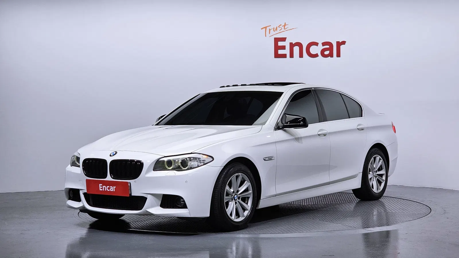 BMW Série 5 (F10) 528i 2010 — photo 1 sur 20