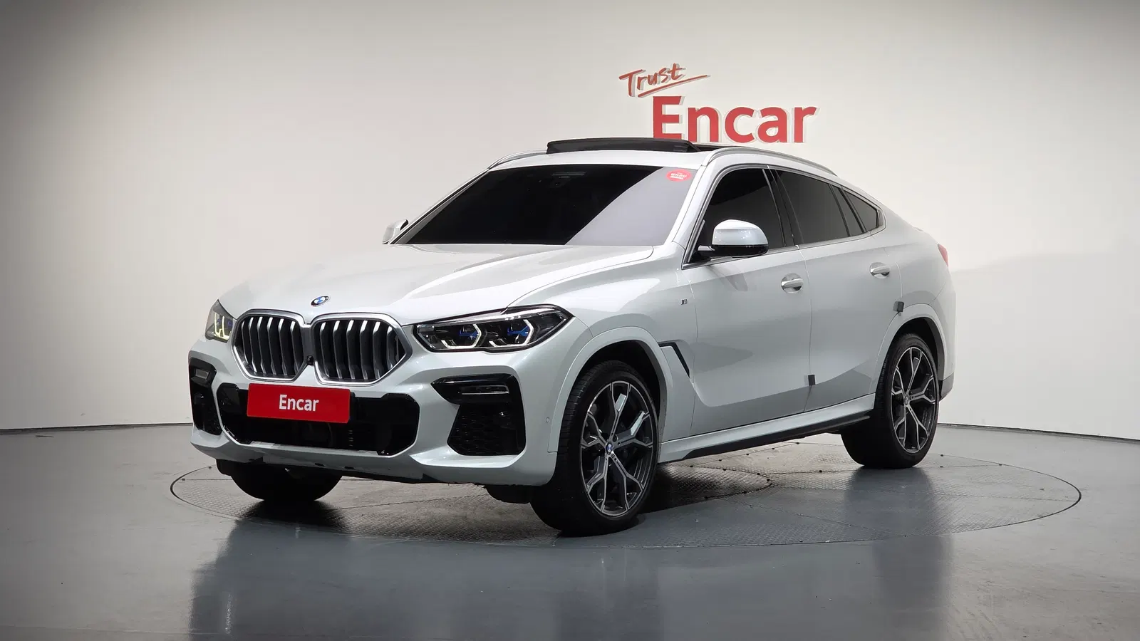 BMW X6 (G06) xDrive40i M Sport 2021 — photo 1 sur 26