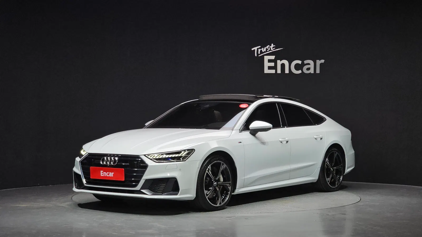 Audi A7 (4K) 55 TFSI Quattro Premium 2021 — photo 1 sur 20