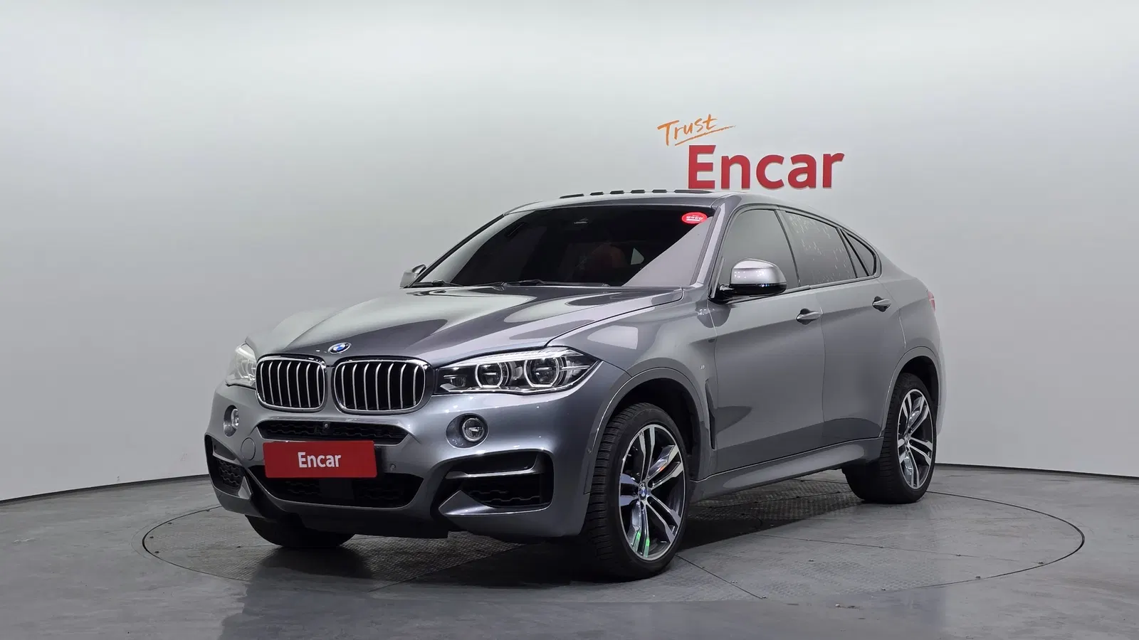 BMW X6 (F16) M50d 2018 — photo 1 sur 20