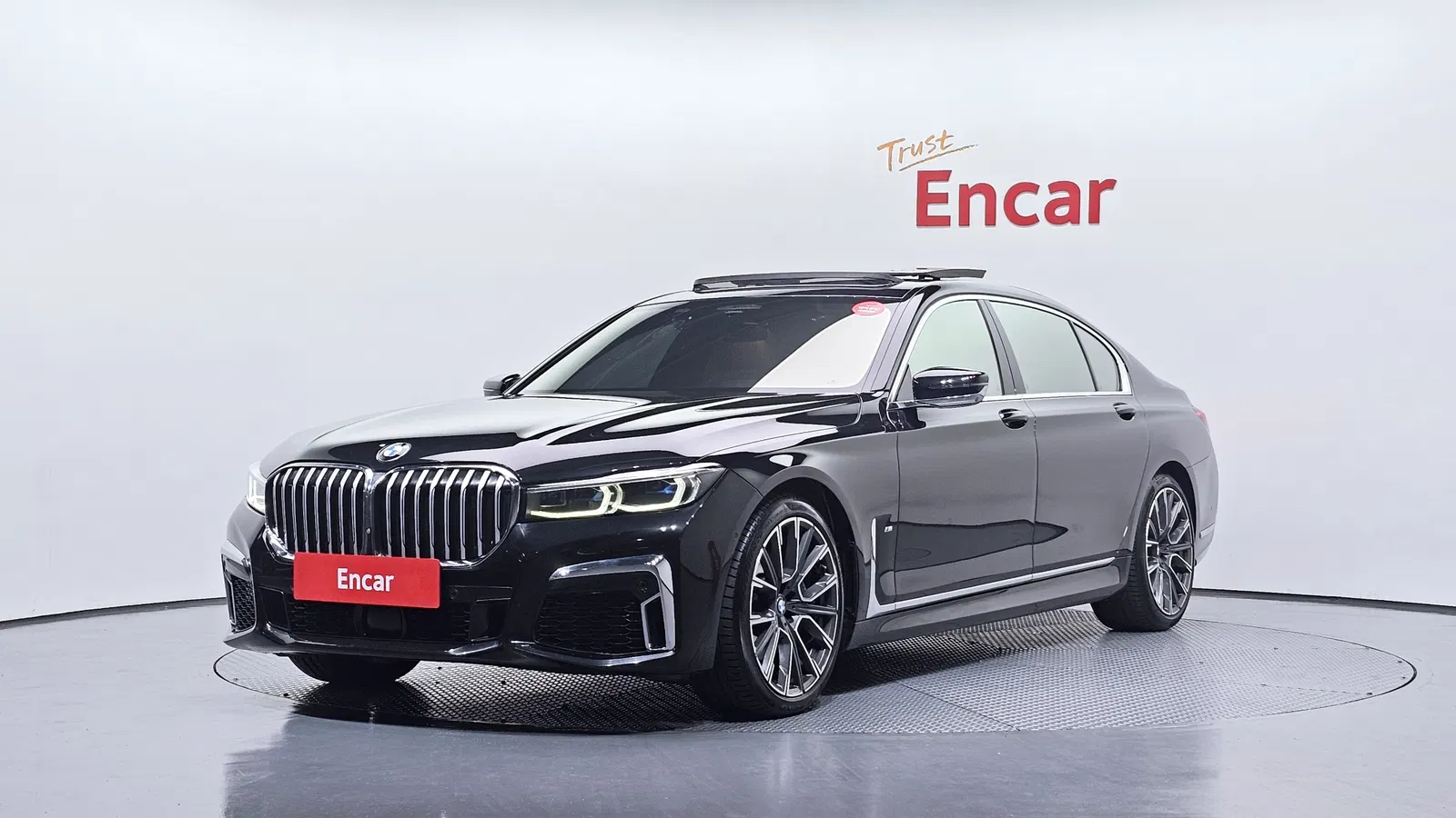 BMW Série 7 (G11) 740Li xDrive M Sport 2021 — photo 1 sur 20