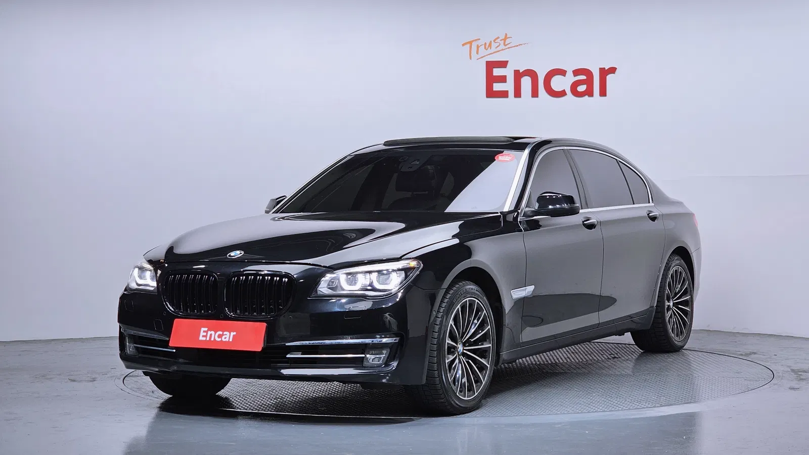BMW Série 7 (F01) 750Li xDrive 2014 — photo 1 sur 26