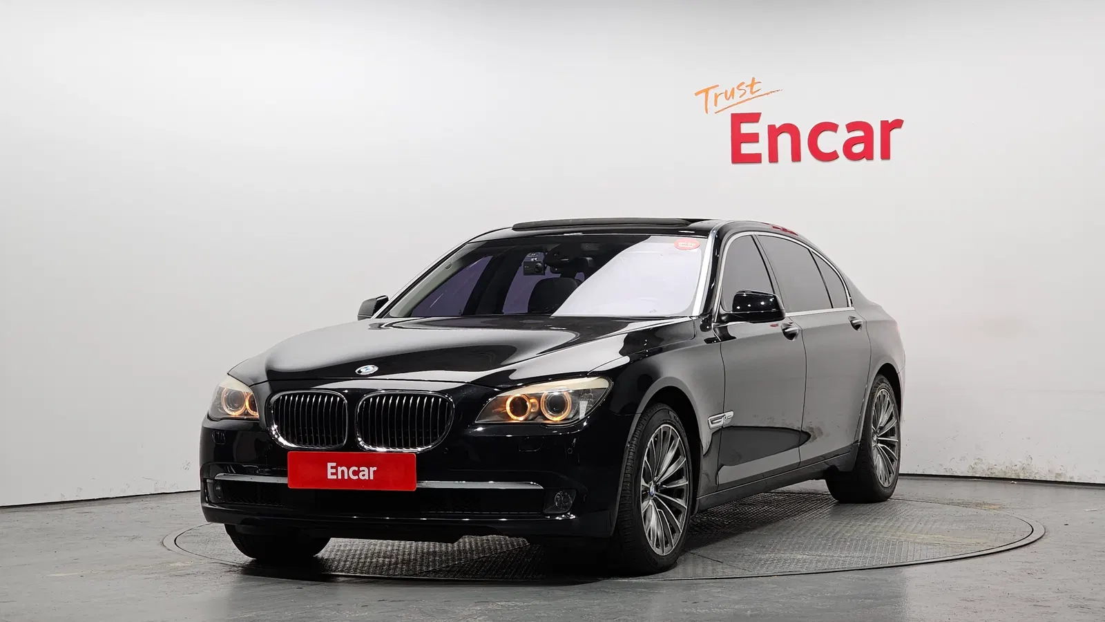 BMW Série 7 (F01) 750Li xDrive 2012 — photo 1 sur 26