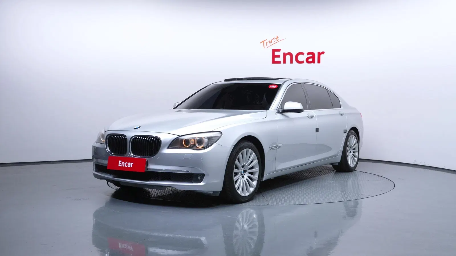 BMW Série 7 (F01) 740Li 2010 — photo 1 sur 8