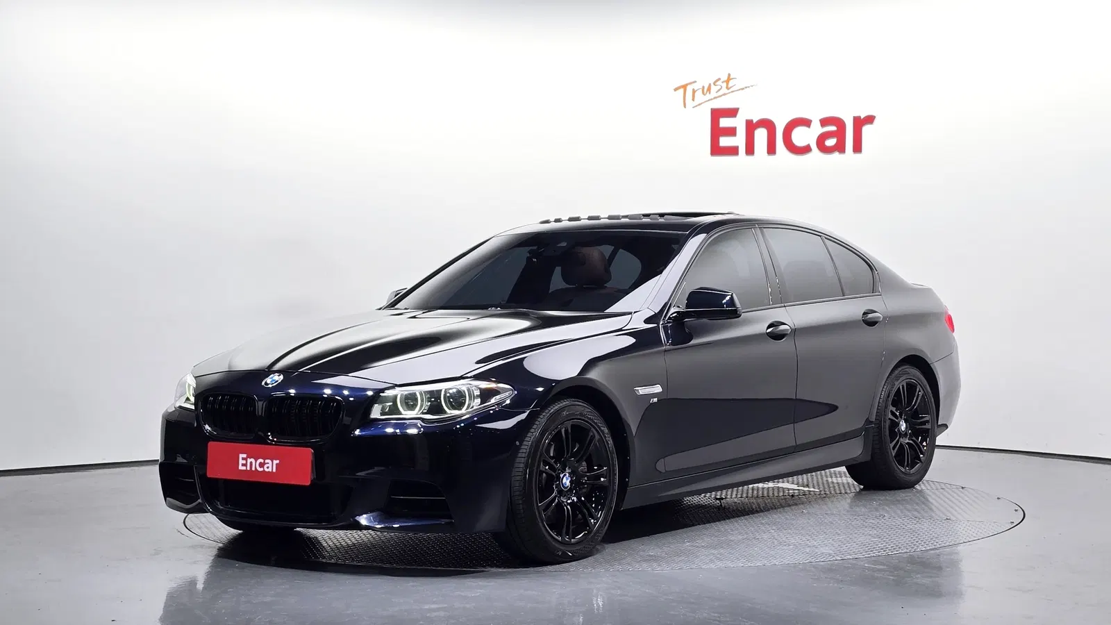 BMW Série 5 (F10) M550d xDrive 2014 — photo 1 sur 20