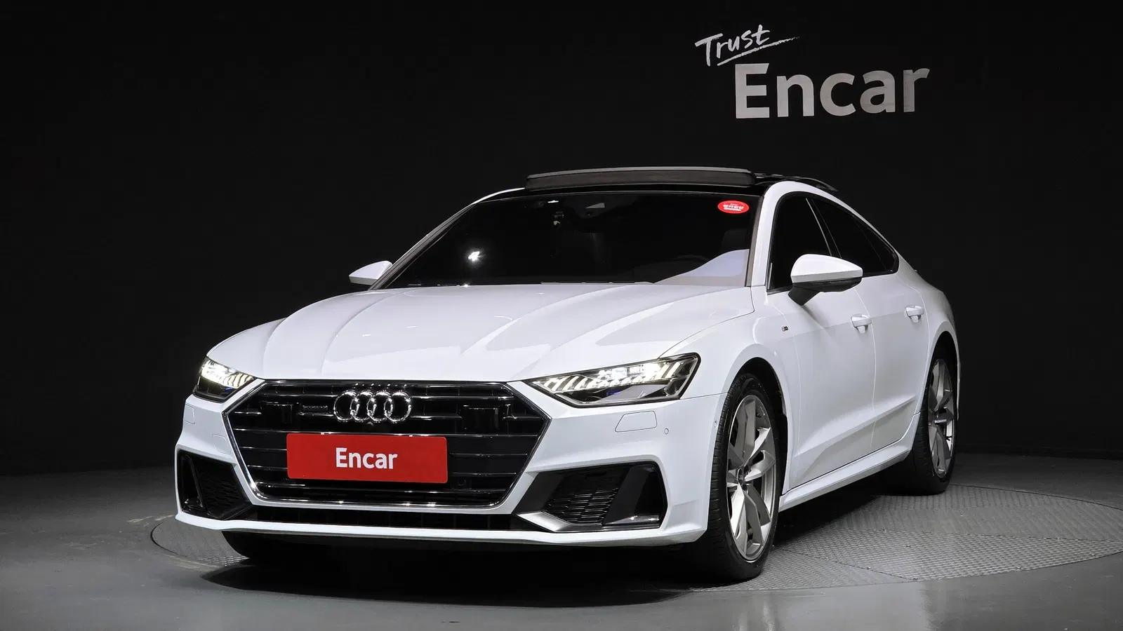 Audi A7 (4K) 55 TFSI Quattro Premium 2021 — photo 1 sur 26