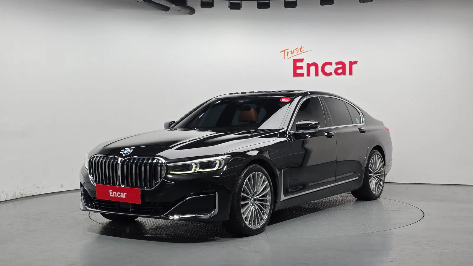 BMW Série 7 (G11) 730d xDrive Design Pure Excellence 2021 — photo 1 sur 20