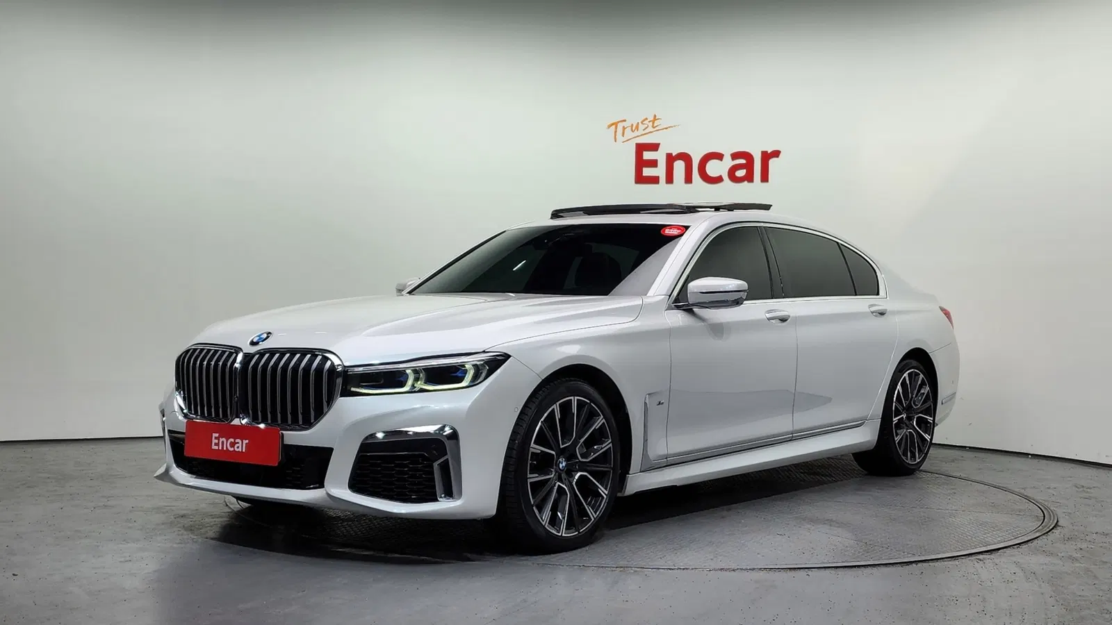 BMW Série 7 (G11) 740Li xDrive M Sport 2021 — photo 1 sur 42