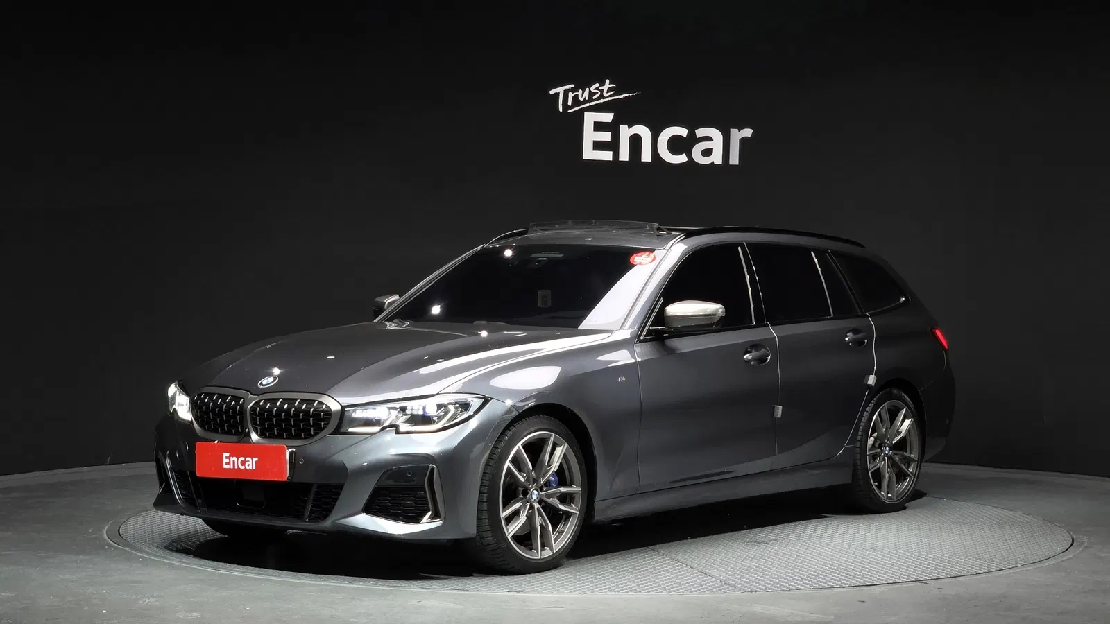 BMW Série 3 (G20) M340i xDrive Touring 2021 — photo 1 sur 20