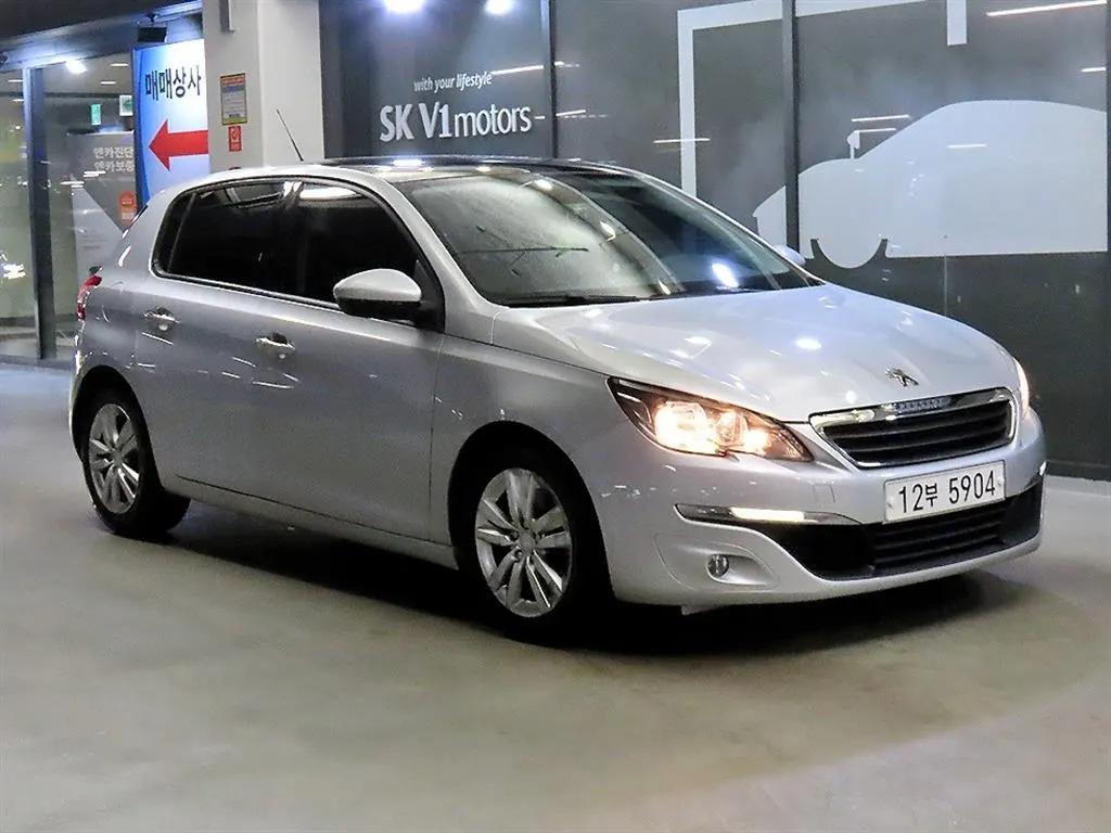 Peugeot 308 2e génération 2.0 BlueHDi Allure 2015 — photo 1 sur 19