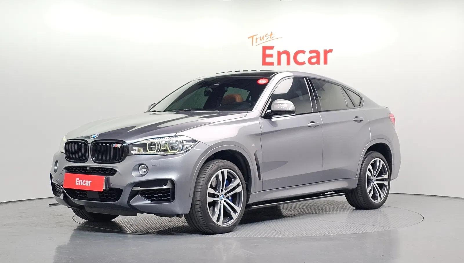 BMW X6 (F16) M50d 2015 — photo 1 sur 20