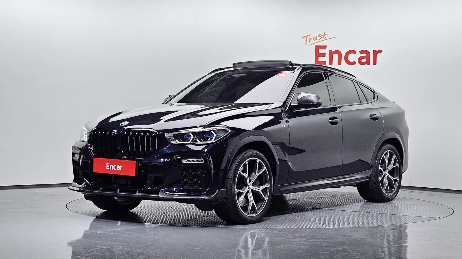 BMW X6 (G06) xDrive40i M Sport 2020 — photo 1 sur 33