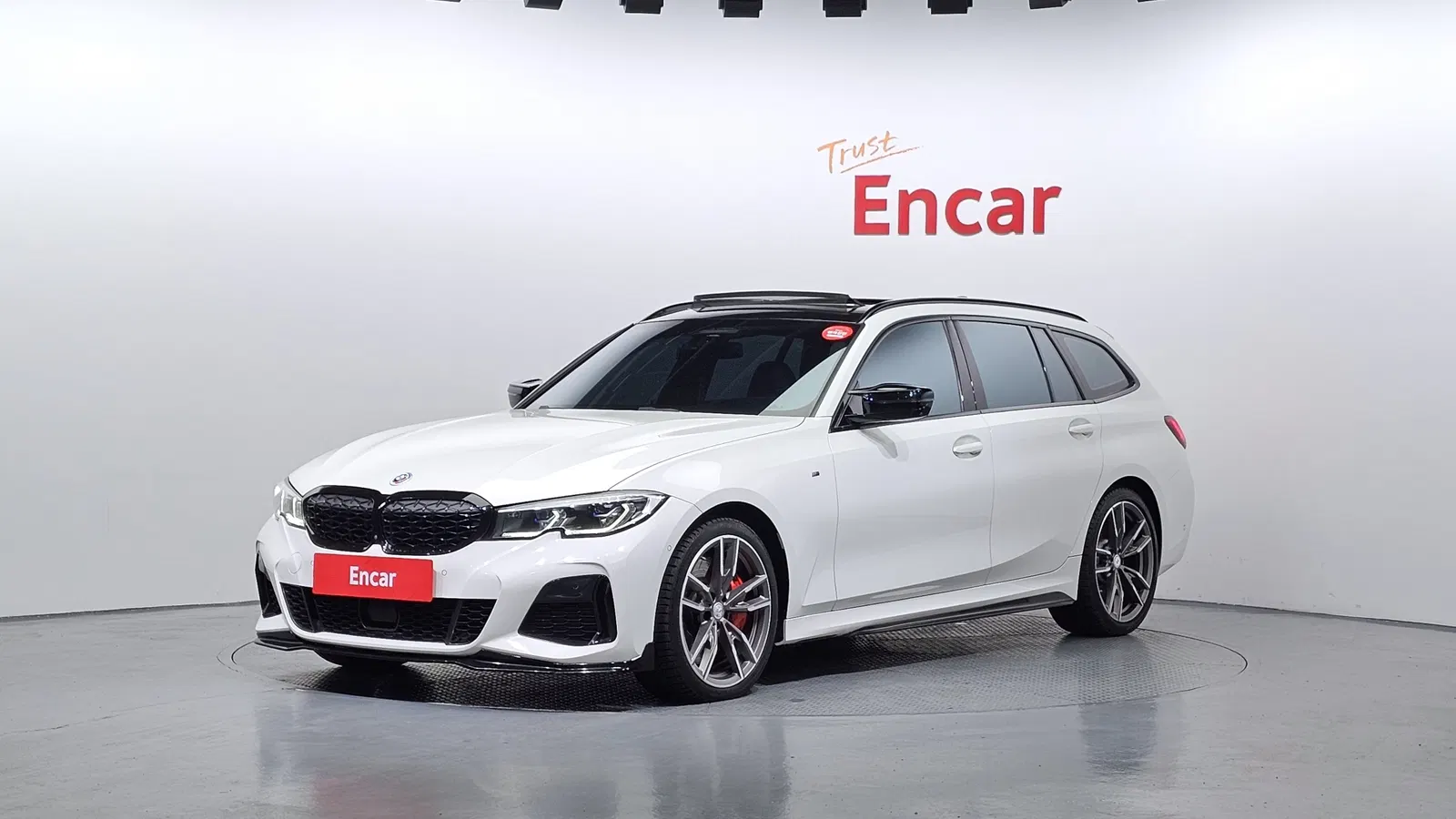 BMW Série 3 (G20) M340i xDrive Touring 2021 — photo 1 sur 20