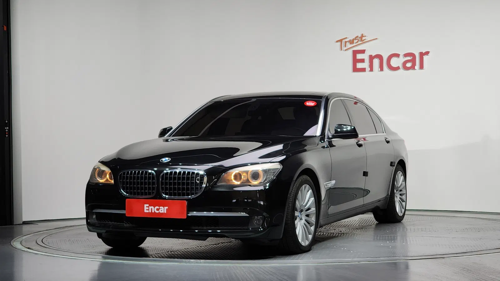 BMW Série 7 (F01) 750Li 2010 — photo 1 sur 8