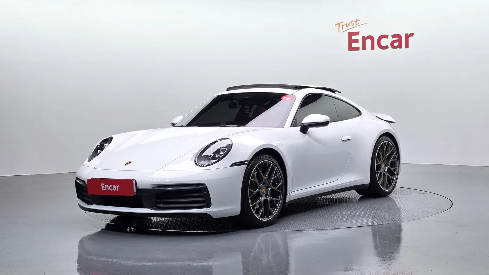 Porsche 911 (992) Carrera 4 2020 — photo 1 sur 37