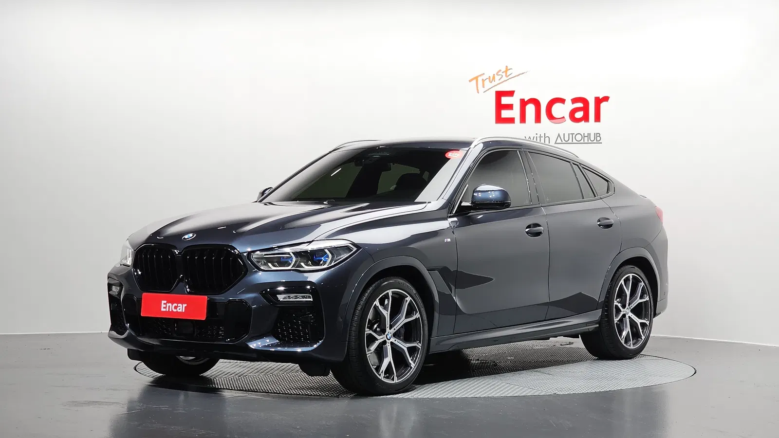 BMW X6 (G06) xDrive40i M Sport 2021 — photo 1 sur 8