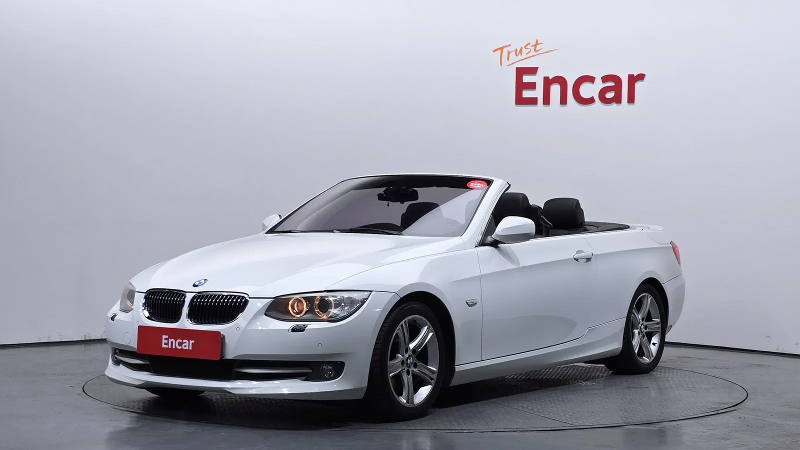 BMW Série 3 (E90) 328i Convertible 2013 — photo 1 sur 20