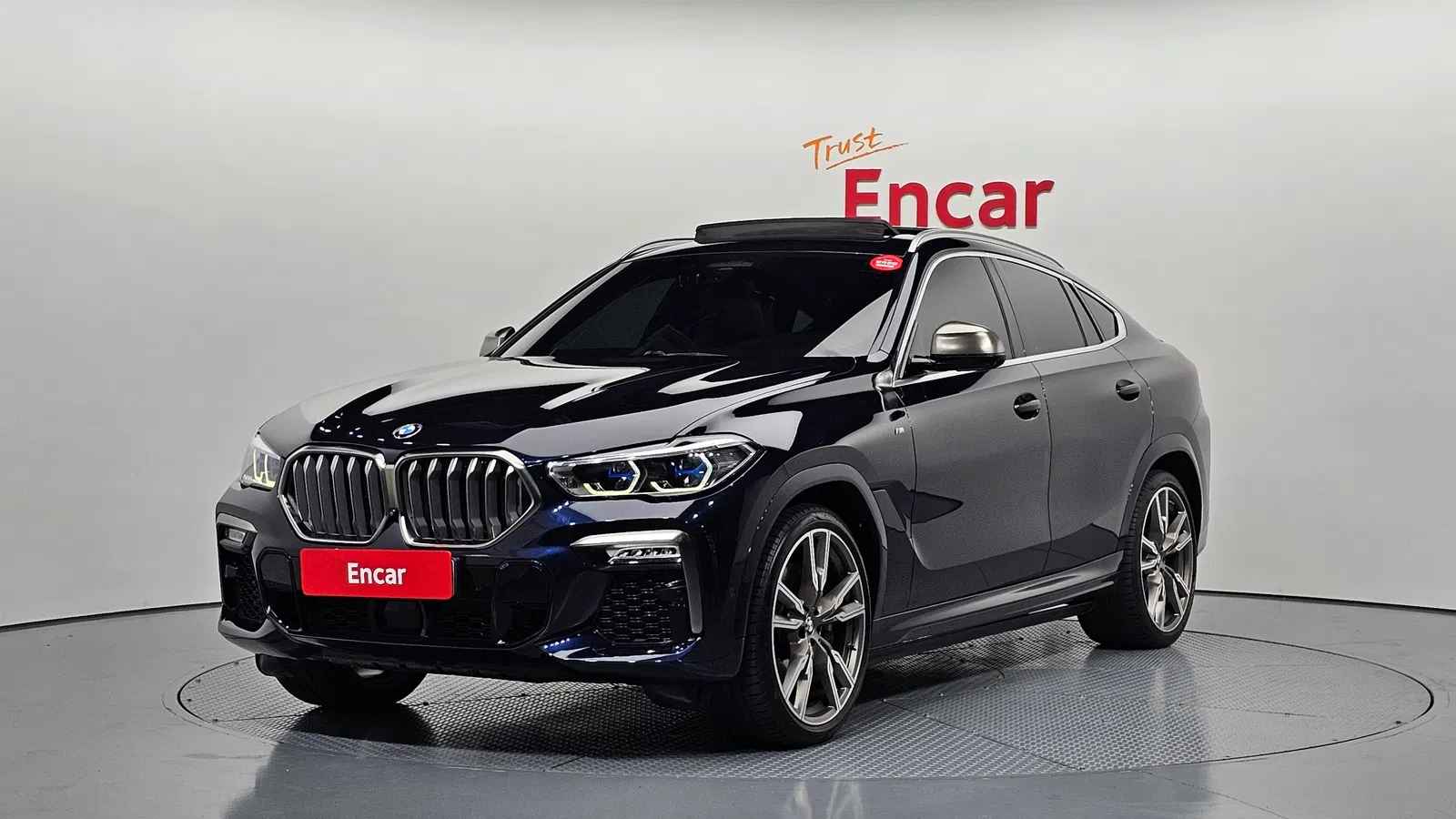 BMW X6 (G06) M50i 2021 — photo 1 sur 20