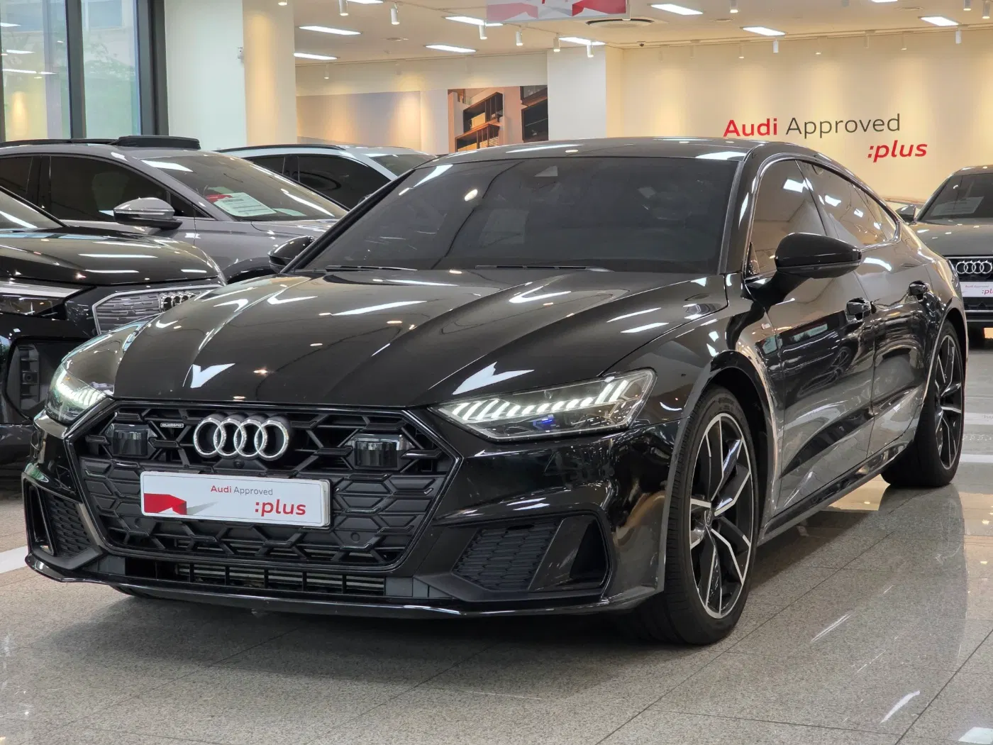 Audi A7 (4K) 55 TFSI e Quattro Premium 2024 — photo 1 sur 26