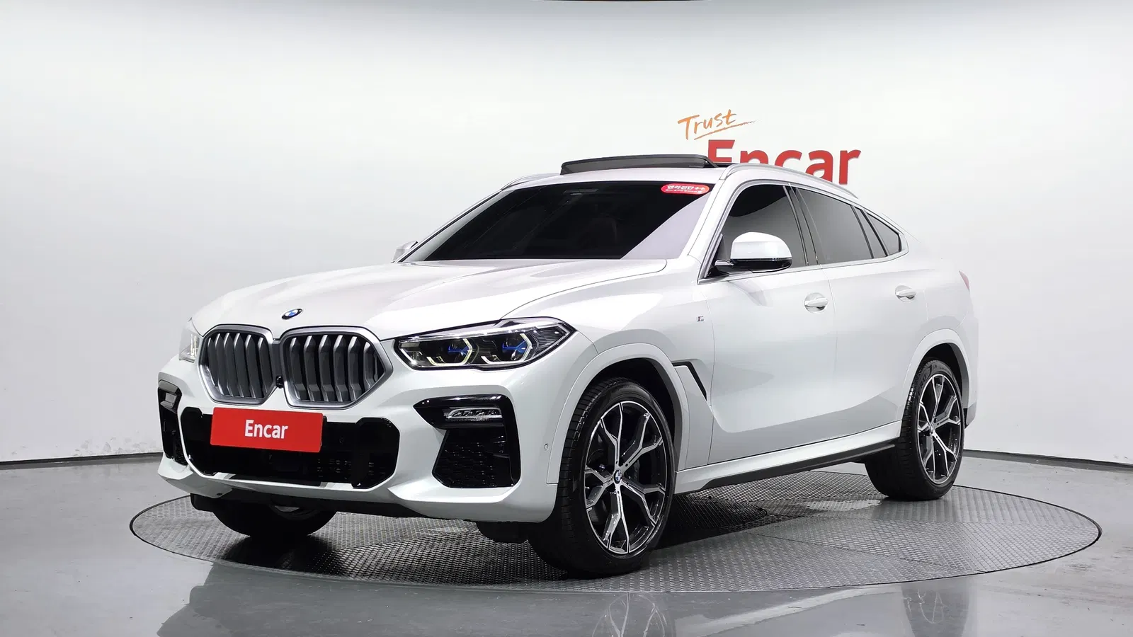 BMW X6 (G06) xDrive40i M Sport 2021 — photo 1 sur 39