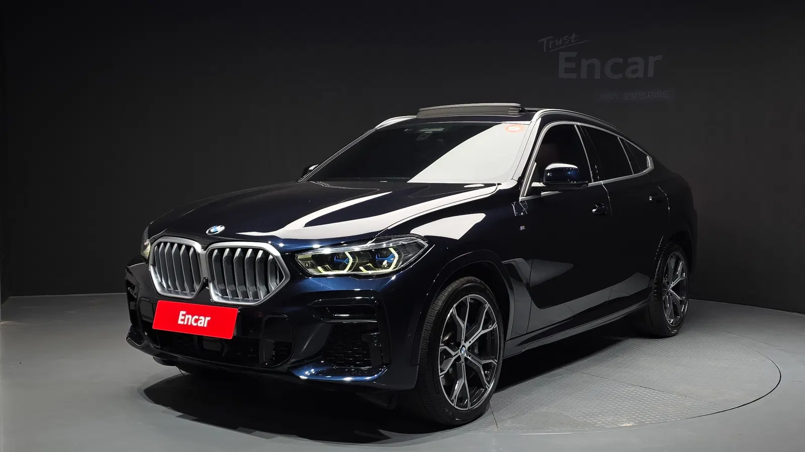 BMW X6 (G06) xDrive40i M Sport 2022 — photo 1 sur 40