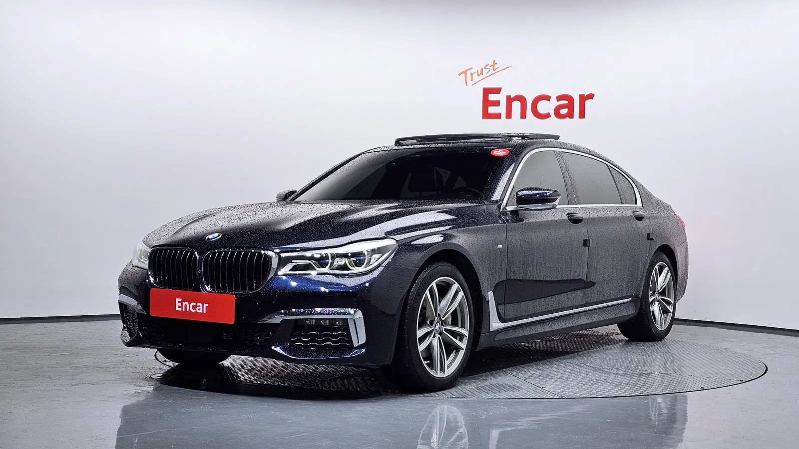 BMW Série 7 (G11) 740Li xDrive M Sport 2018 — photo 1 sur 26