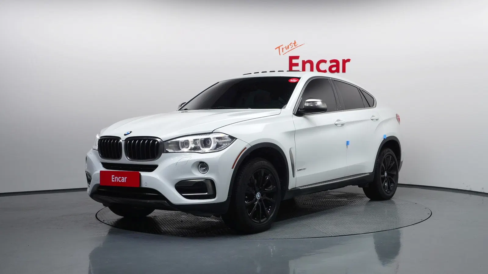 BMW X6 (F16) xDrive 35i 2015 — photo 1 sur 20