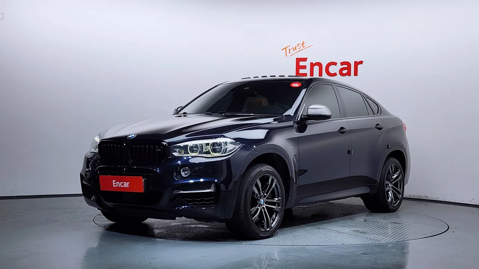 BMW X6 (F16) M50d 2015 — photo 1 sur 20