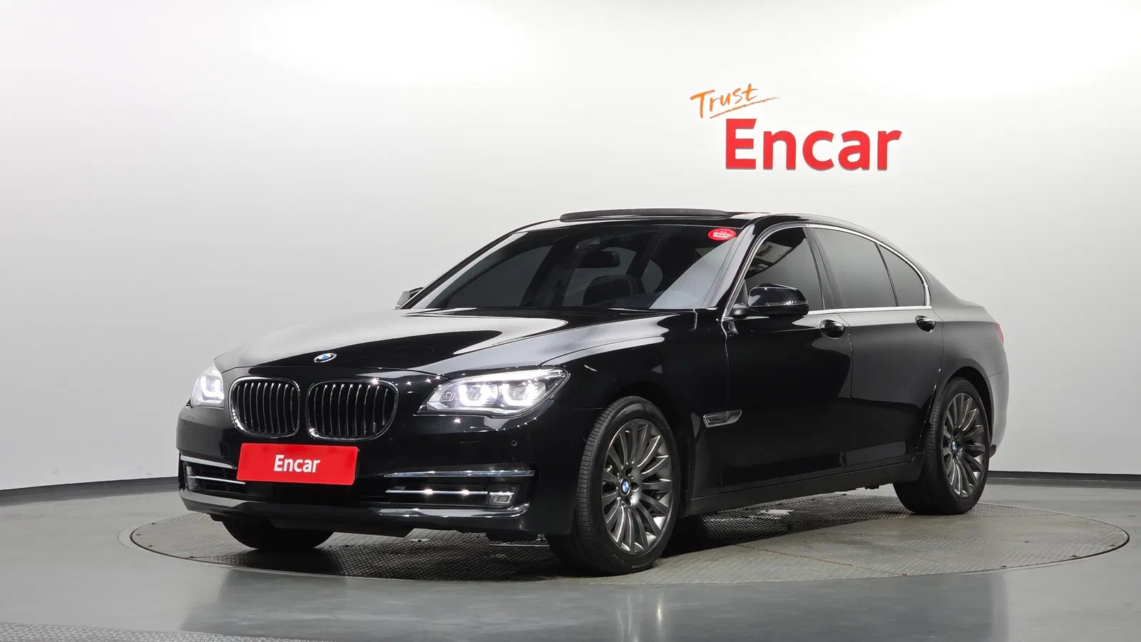 BMW Série 7 (F01) 740d xDrive 2013 — photo 1 sur 20
