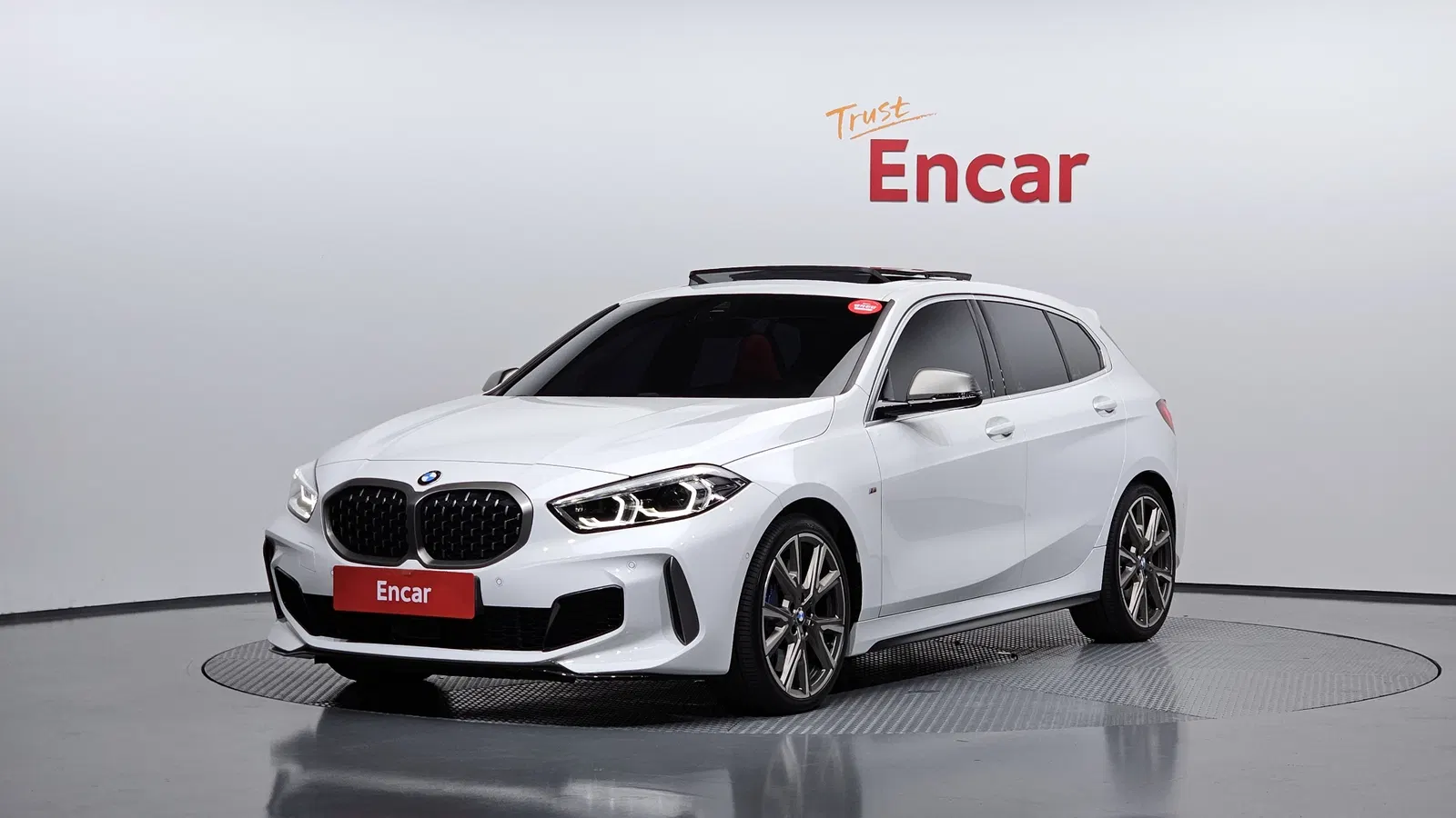 BMW Série 1 (F40) M135i xDrive 2024 — photo 1 sur 34