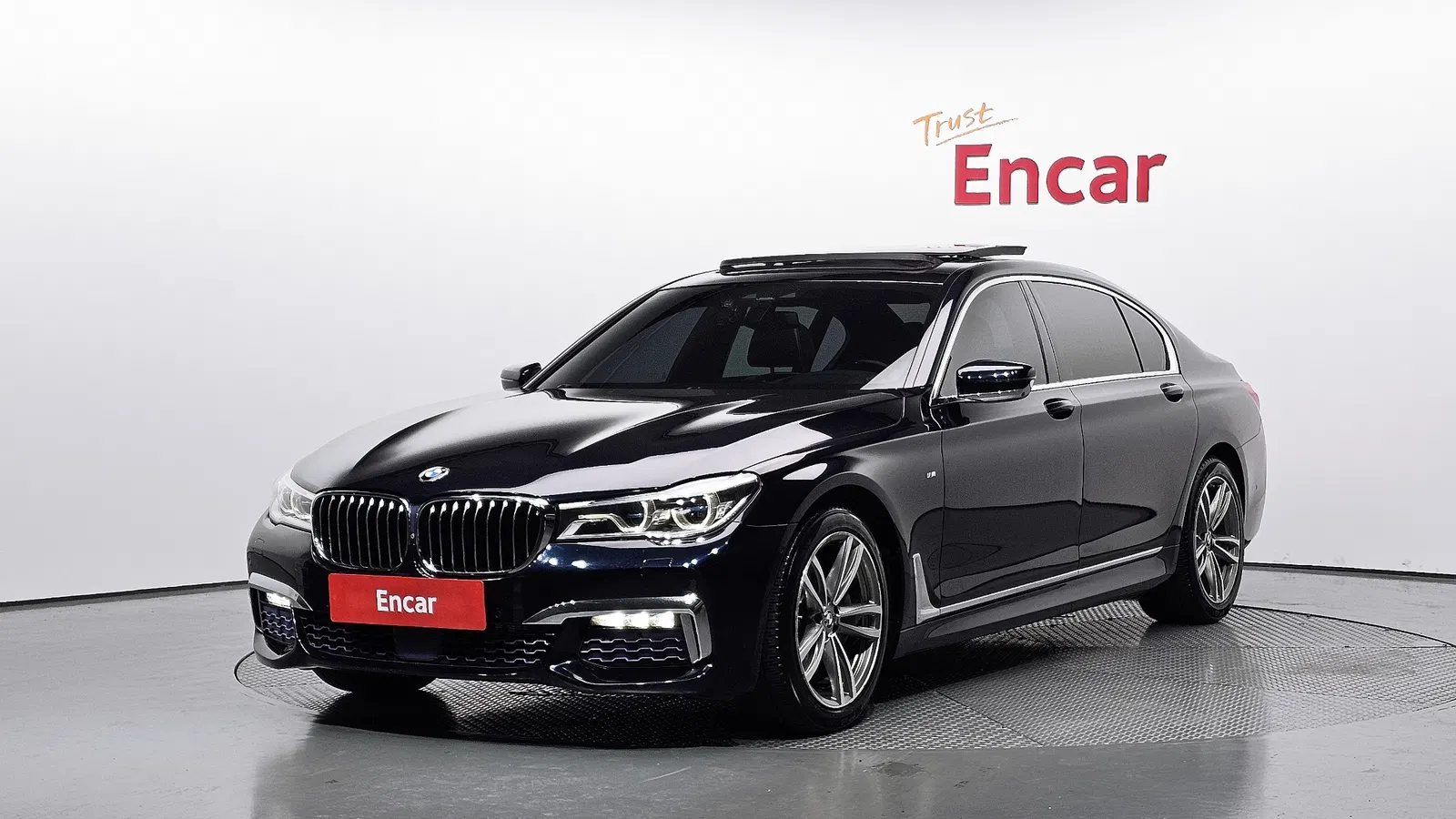 BMW Série 7 (G11) 740Li xDrive M Sport 2017 — photo 1 sur 32