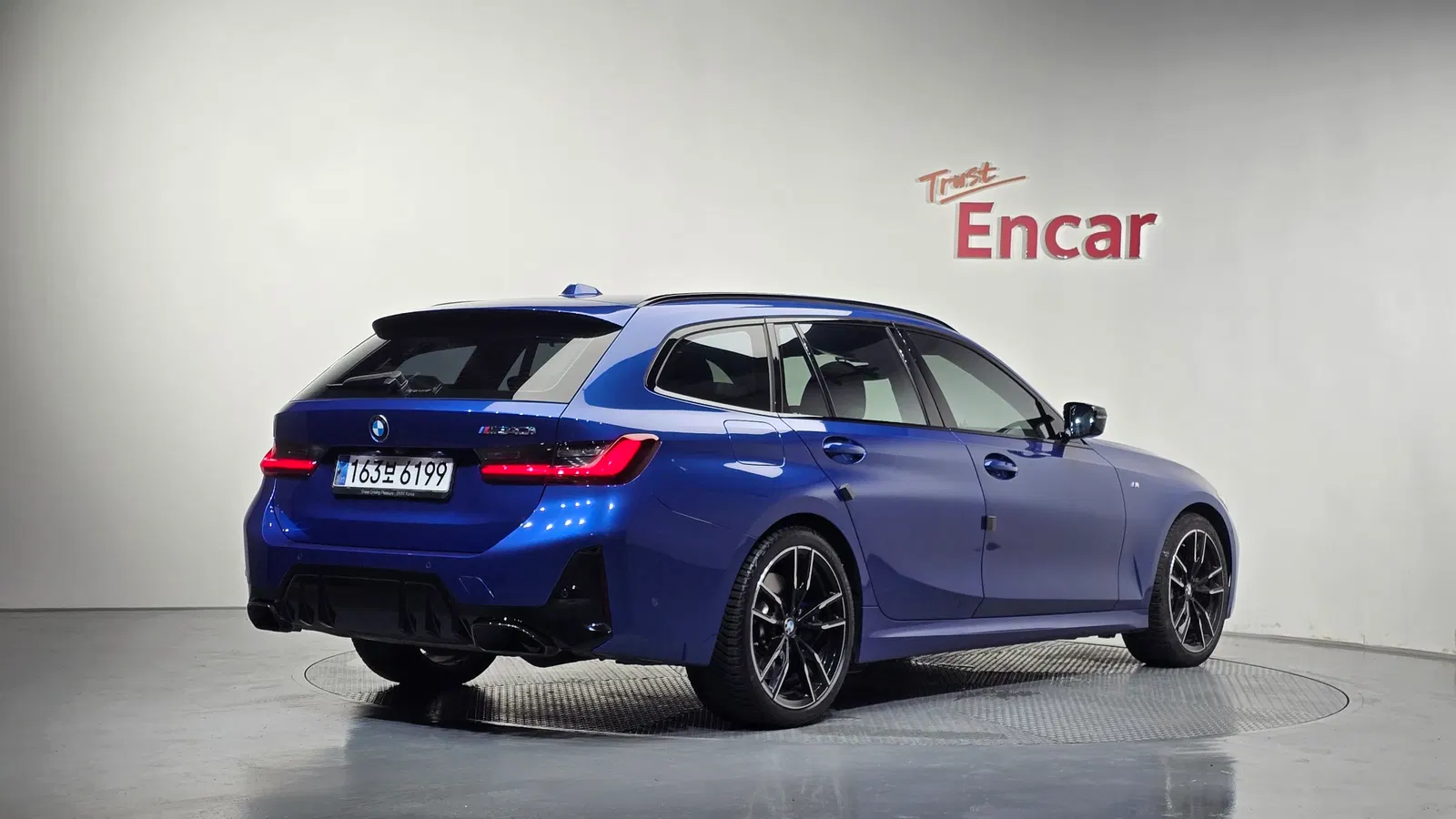 BMW Série 3 (G20) M340i xDrive Touring 2023 — photo 1 sur 33