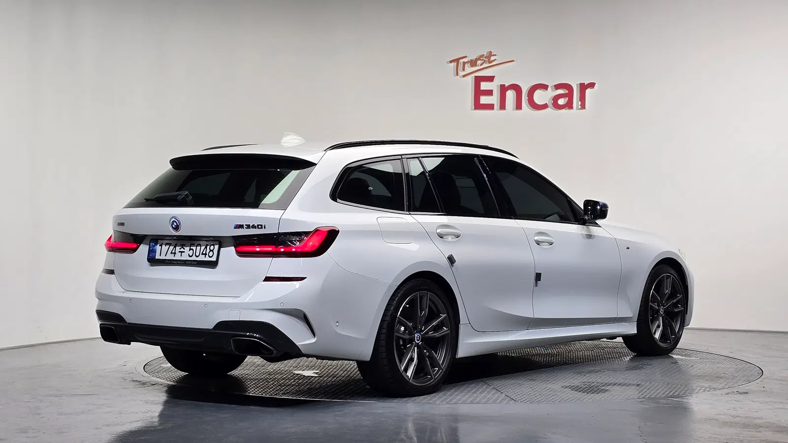 BMW Série 3 (G20) M340i xDrive Touring Performance 2022 — photo 1 sur 32