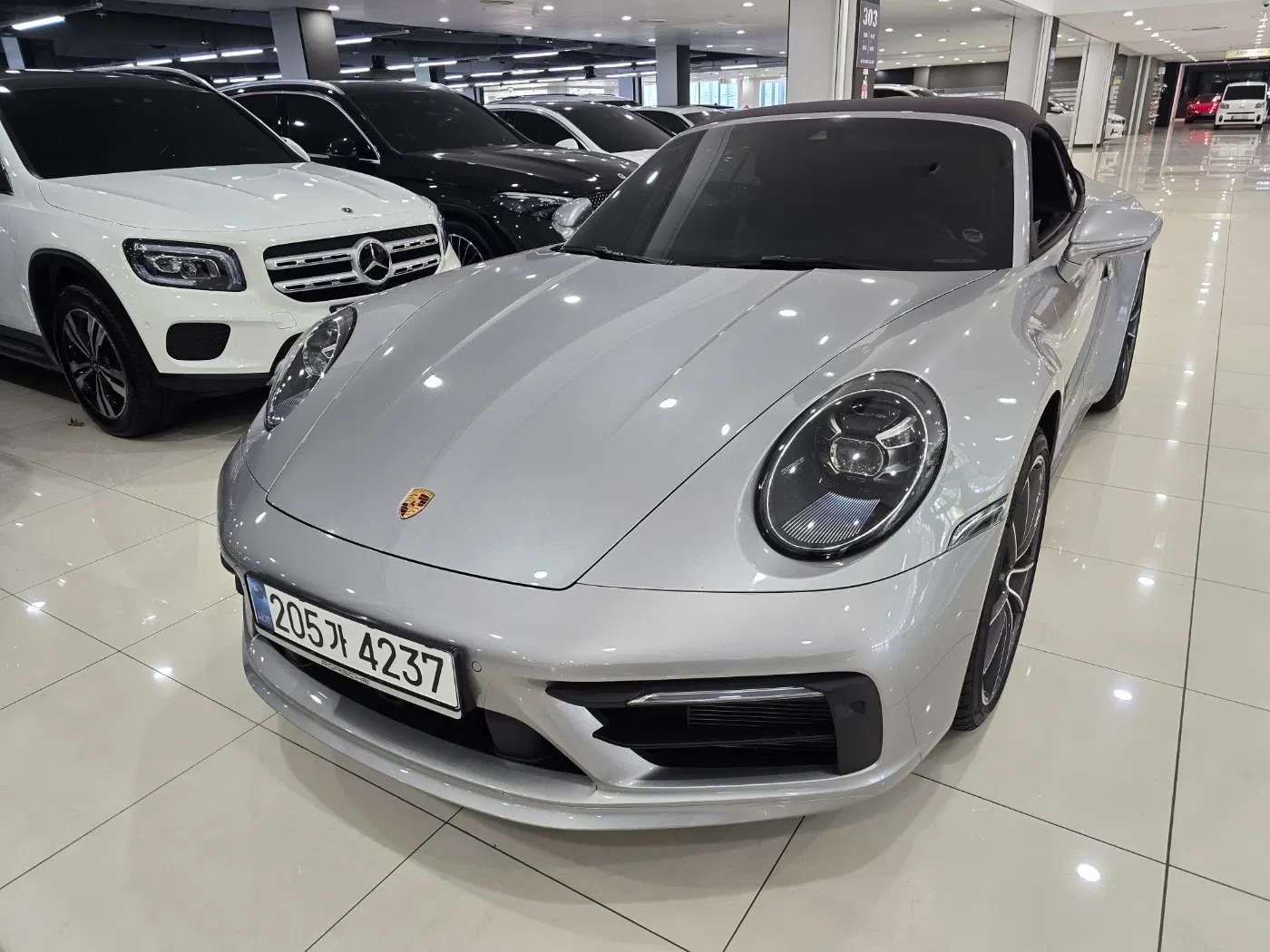 Porsche 911 (992) Carrera 4 Cabriolet 2024 — photo 1 sur 26