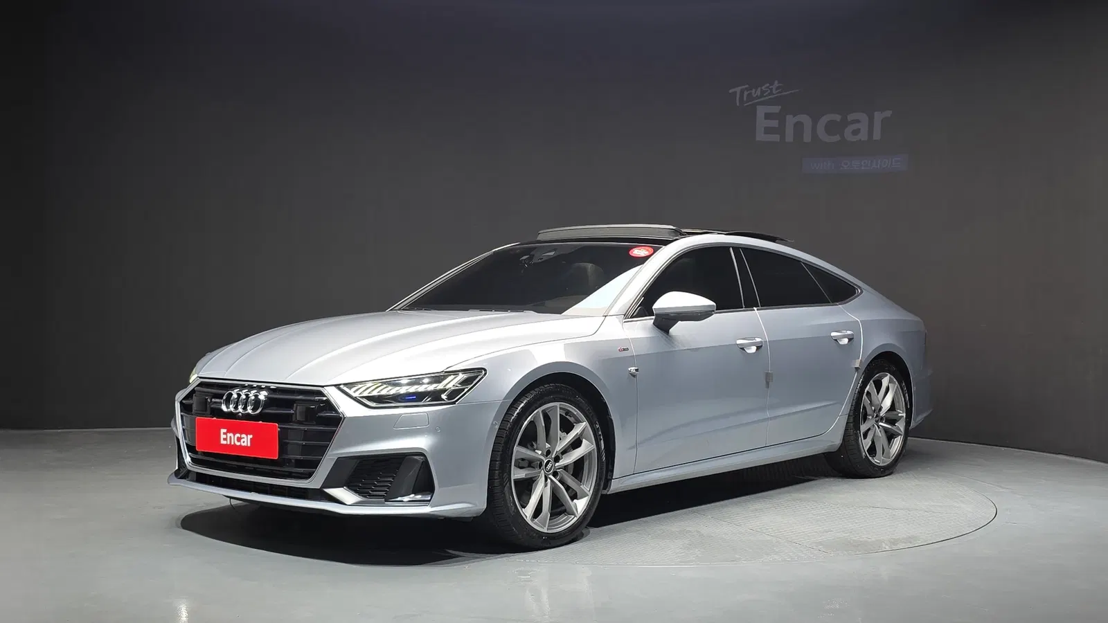 Audi A7 (4K) 55 TFSI Quattro Premium 2021 — photo 1 sur 40