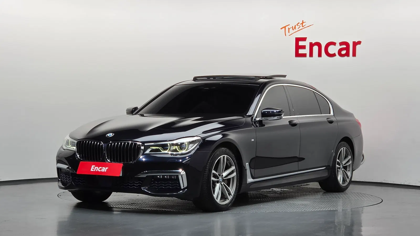 BMW Série 7 (G11) 740Li xDrive M Sport 2017 — photo 1 sur 26