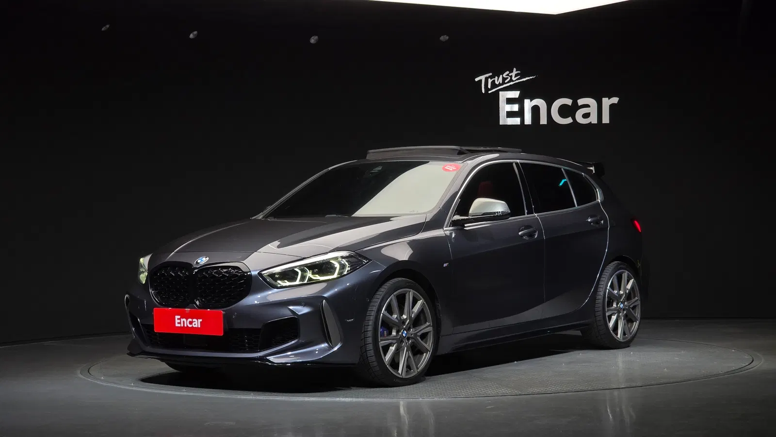 BMW Série 1 (F40) M135i xDrive 2021 — photo 1 sur 31