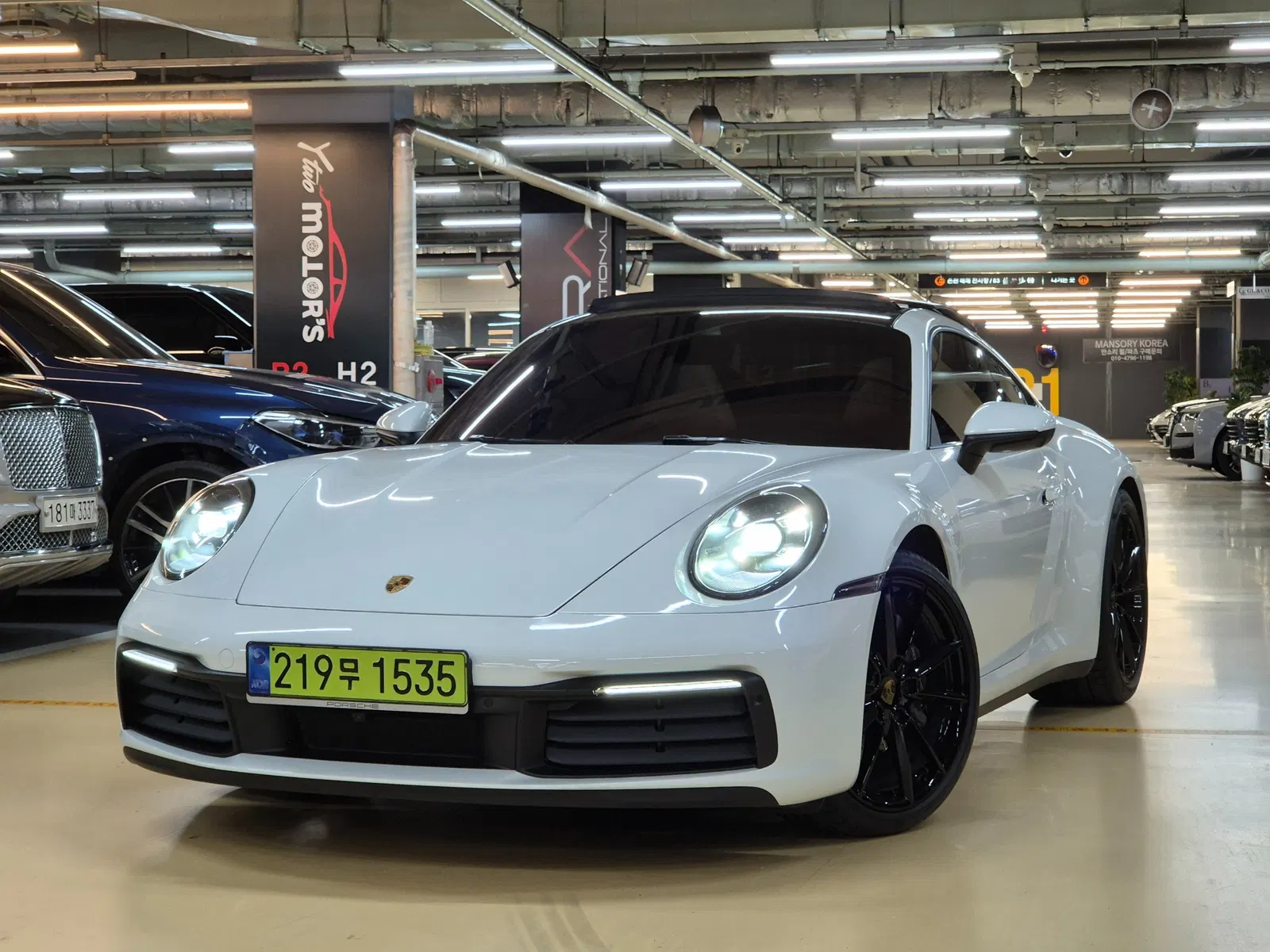 Porsche 911 (992) Carrera 4 2020 — photo 1 sur 26
