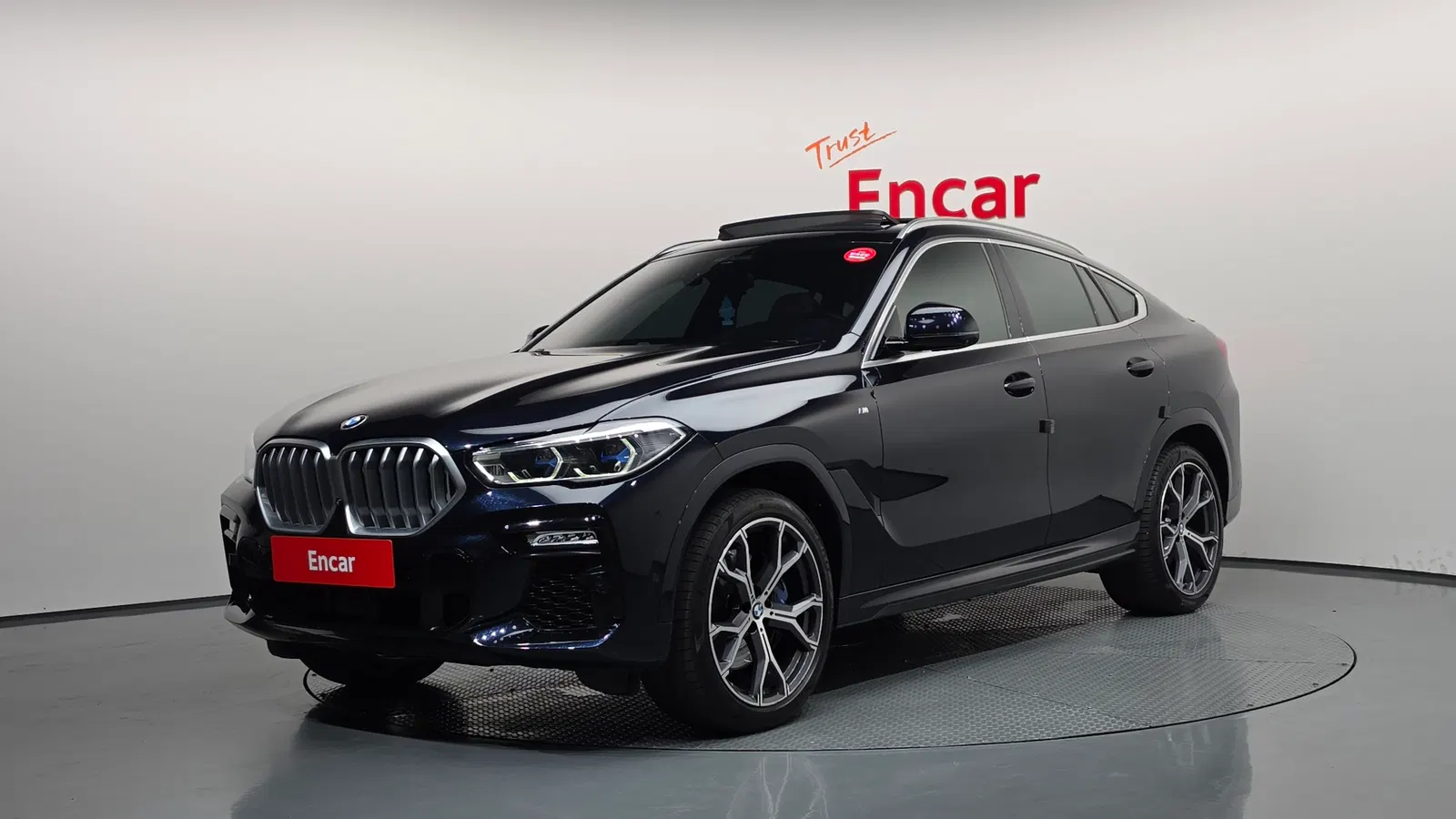 BMW X6 (G06) xDrive30d M Sport 2021 — photo 1 sur 34