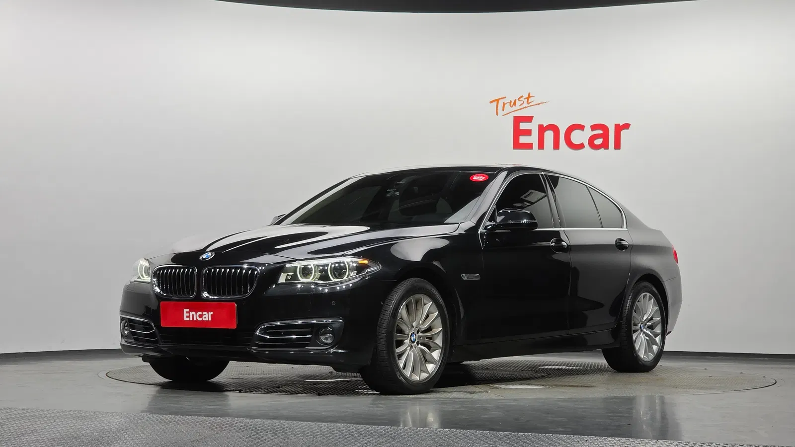 BMW Série 5 (F10) 528i xDrive Luxury 2014 — photo 1 sur 20