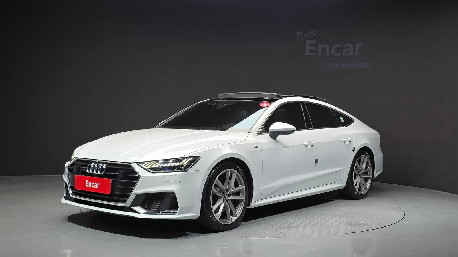 Audi A7 (4K) 55 TFSI Quattro Premium 2021 — photo 1 sur 35