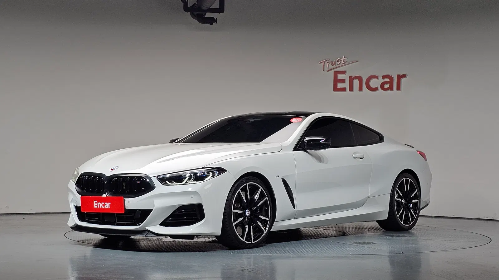 BMW Série 8 (G15) M850i xDrive Coupé 2022 — photo 1 sur 20