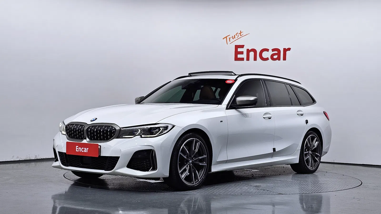 BMW Série 3 (G20) M340i xDrive Touring Performance 2022 — photo 1 sur 37