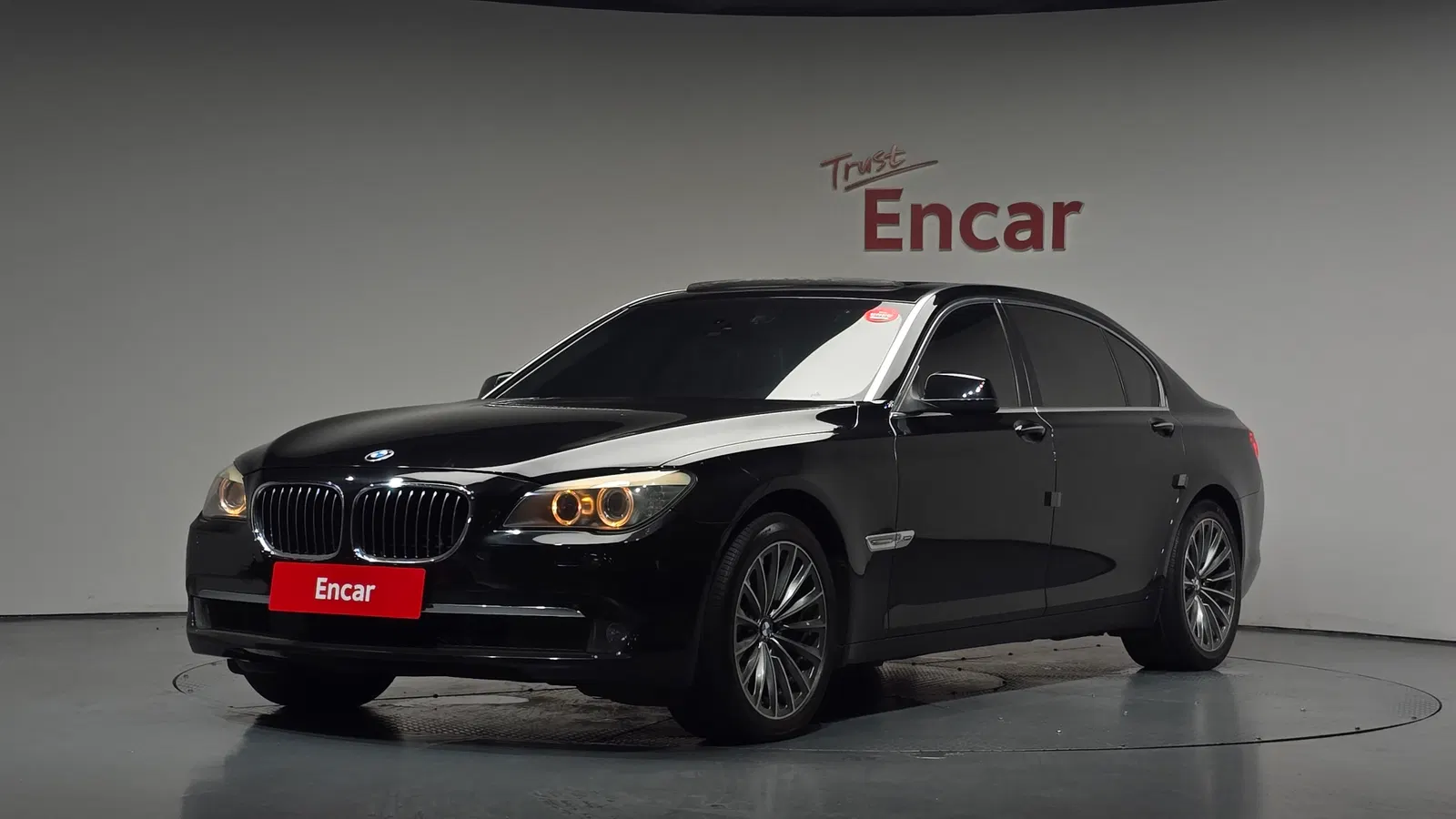 BMW Série 7 (F01) 750Li xDrive 2012 — photo 1 sur 32