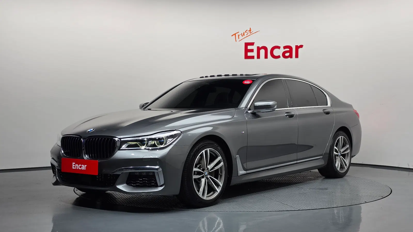 BMW Série 7 (G11) 730d xDrive M Sport 2018 — photo 1 sur 37
