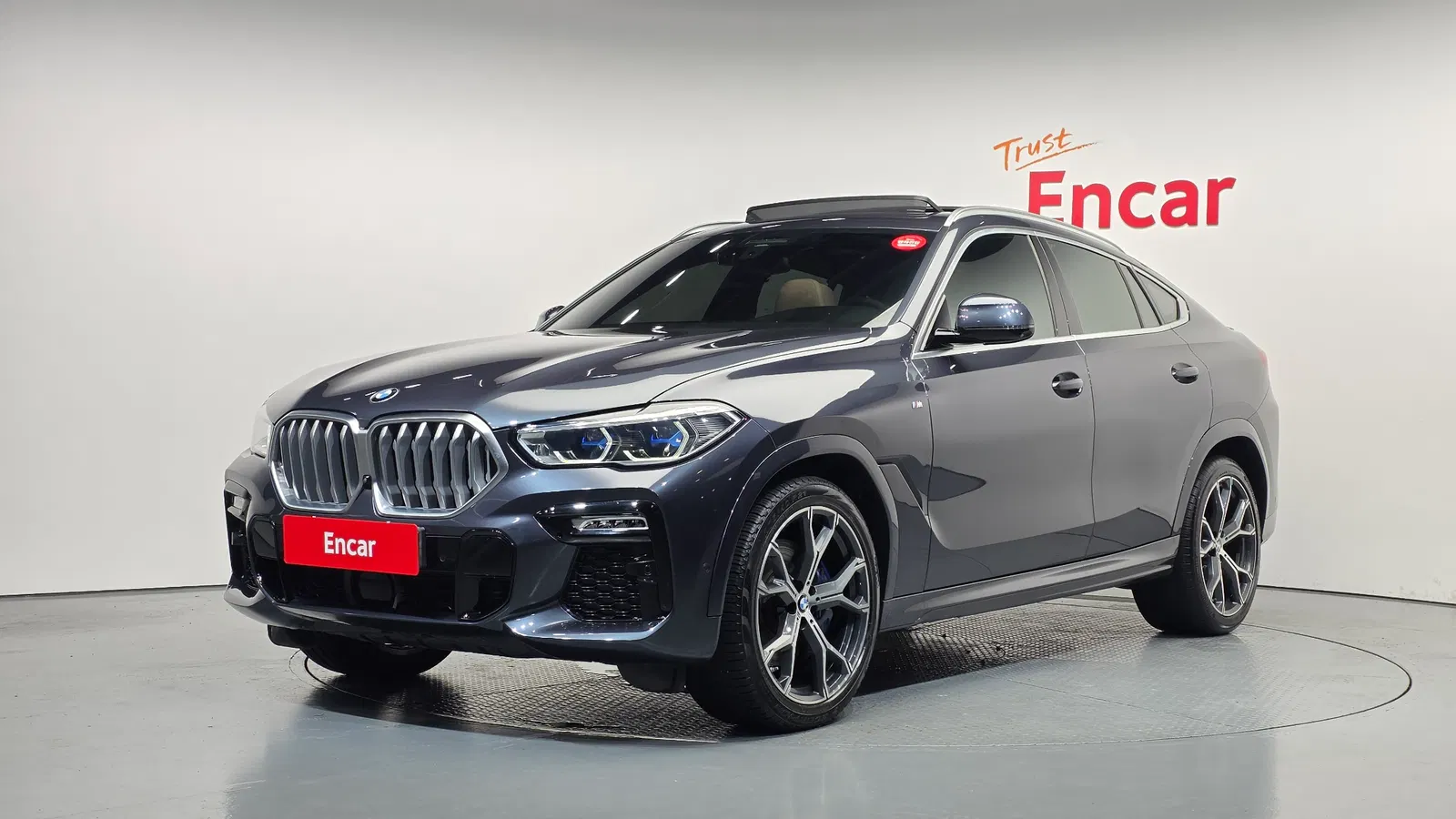 BMW X6 (G06) xDrive40i M Sport 2021 — photo 1 sur 32